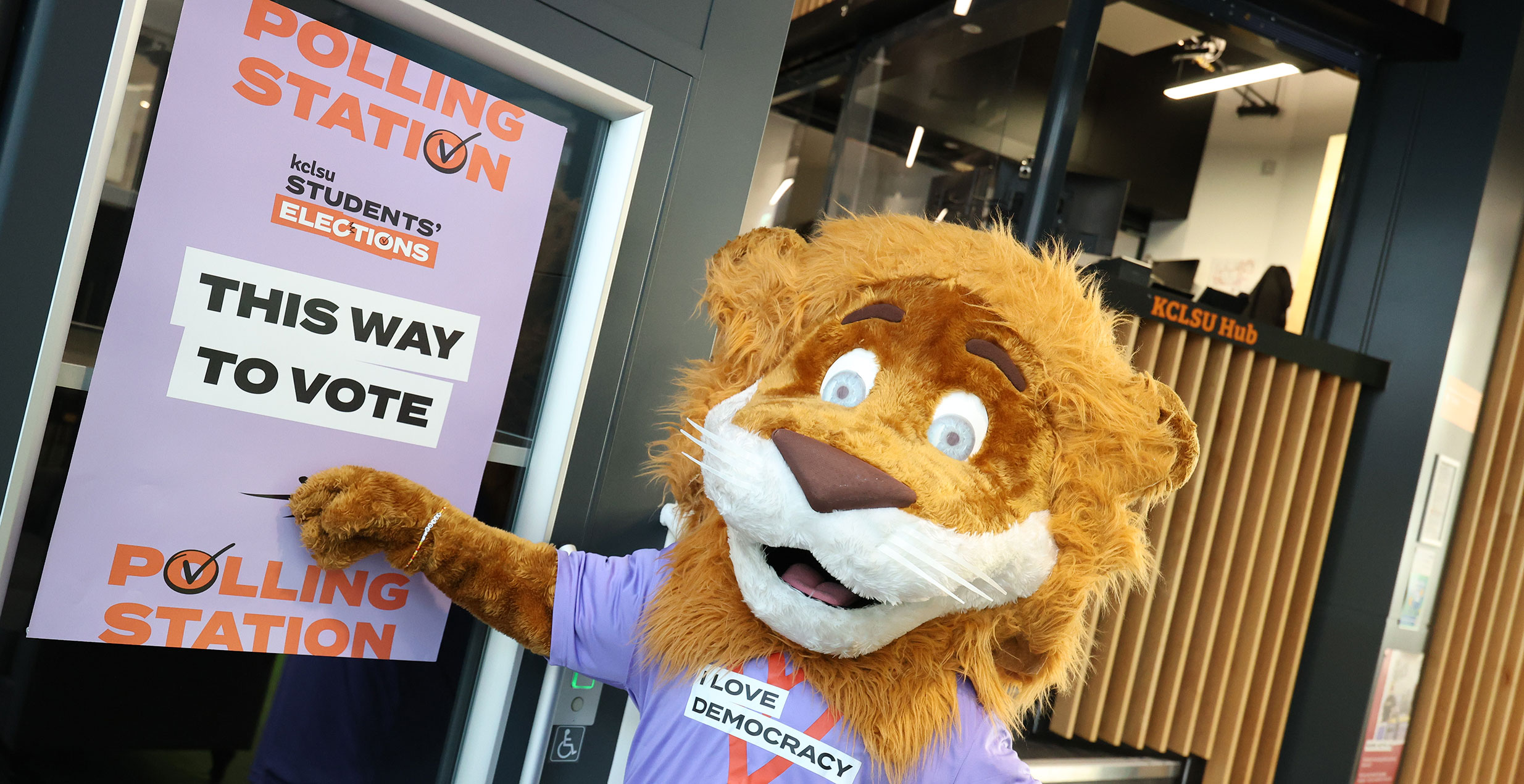 Reggie the lion at a voting booth photo